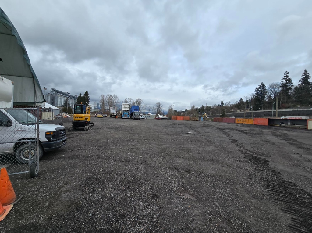 Ground-level view of expansive gravel yard