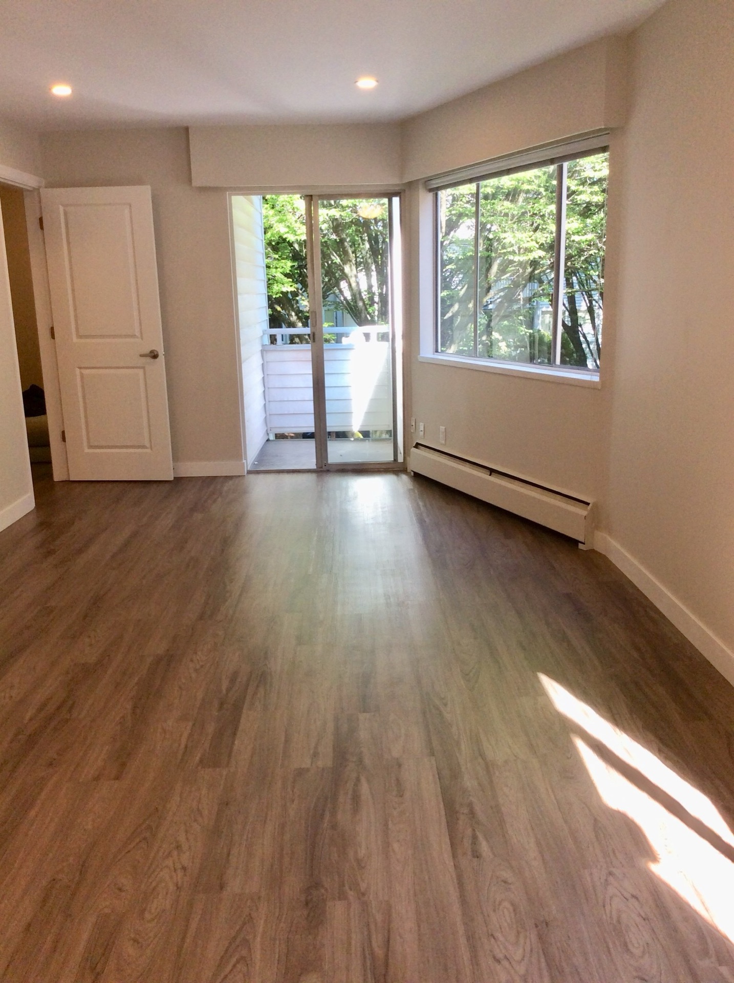 #202–8635 Fremlin Street — Unfurnished Corner Suite, photo 1