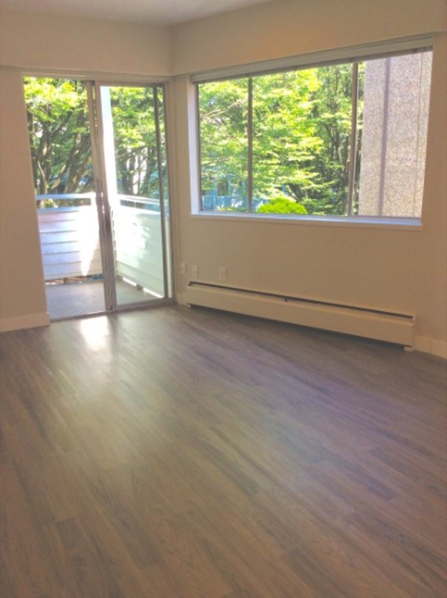 #202–8635 Fremlin Street — Unfurnished Corner Suite, photo 3